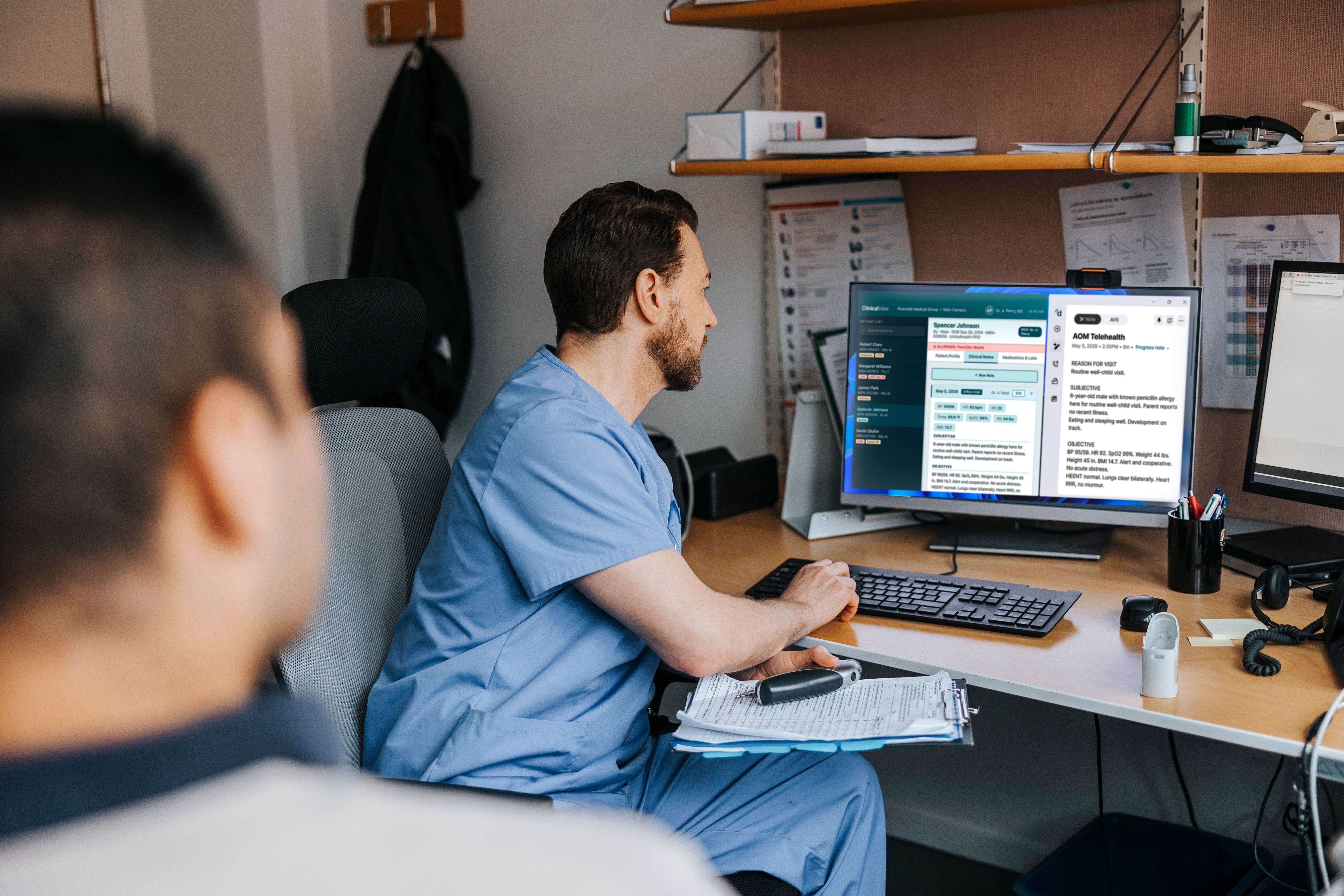 Clinician using Doximity in daily workflow with patient